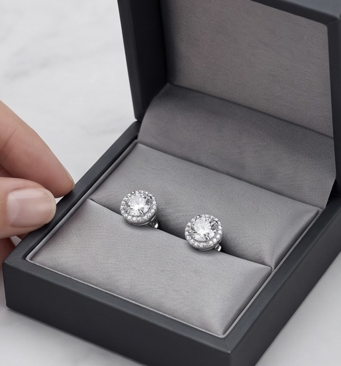 Genuine 0.4 carat Moissanite .925 Sterling Silver handcrafted Earrings - Moissanite earrings in a box, top view, .925 Sterling Silver.