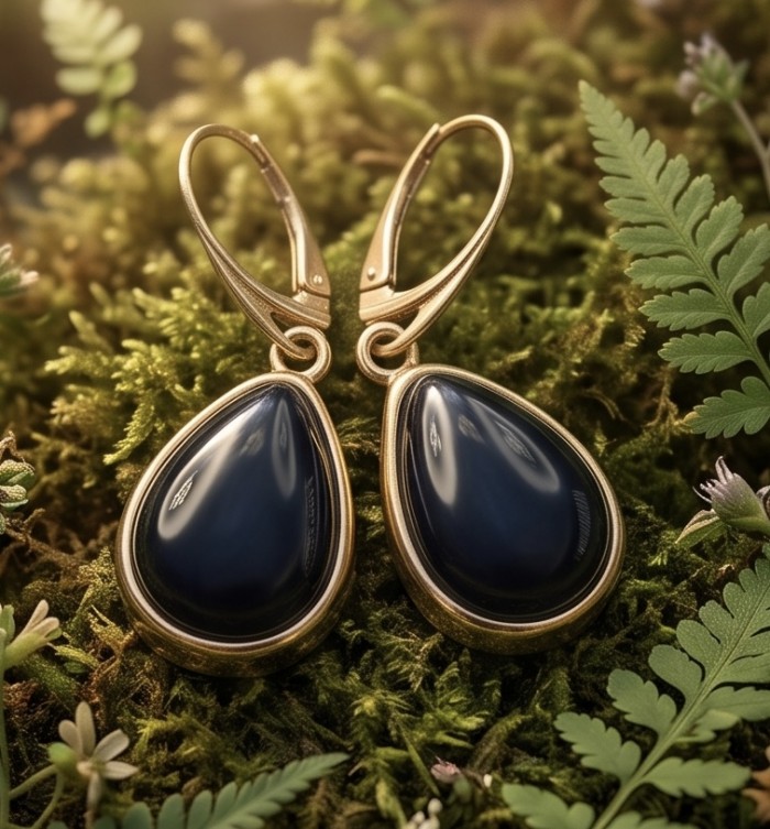 Outstanding authentic Onyx 14K Gold over .925 Sterling Silver Earrings - Onyx earrings in gold over silver on moss, close-up front view.