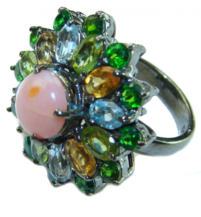 Stella 22.5 carat Pink Opal black rhodium over .925 Sterling Silver handcrafted Ring size 7 3/4 - Close-up of colorful gemstone ring on black rhodium sterling silver.