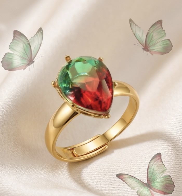 8.8 carat Brazilian Tourmaline .925 Sterling Silver dipped in 18K Gold Perfectly handcrafted Ring s. 8 adjustable - Close-up of Brazilian Tourmaline ring on fabric with butterflies