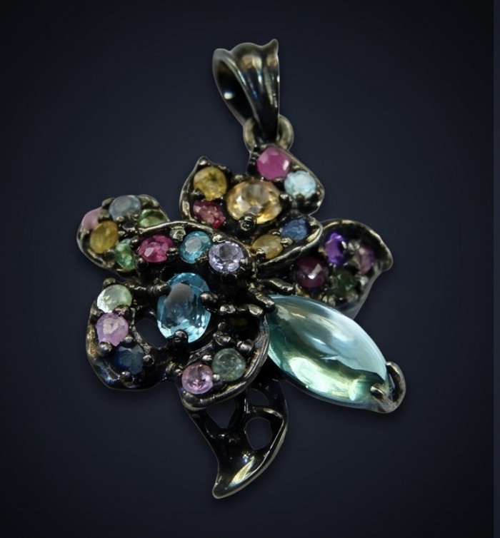 Colors of the Earth Precious 14.5 carat Multigem .925 Sterling Silver dipped in black rhodium Pendant - Multigem flower pendant close-up on dark background