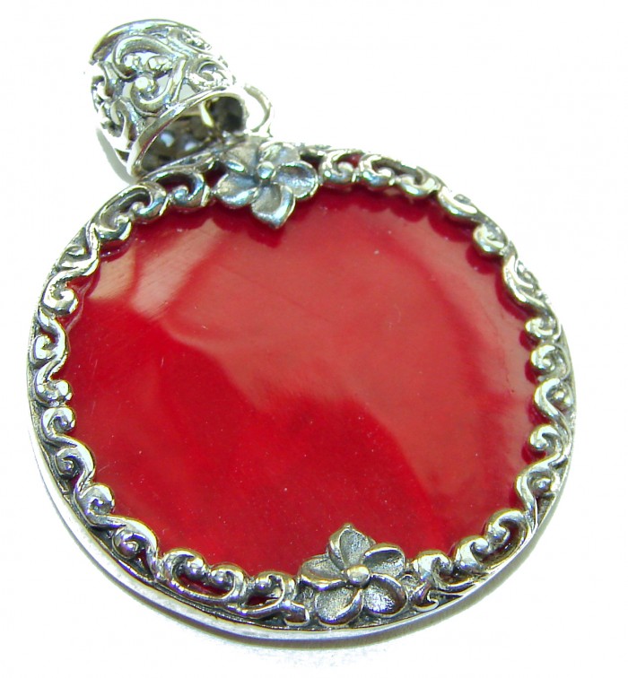Bright Energy Authentic Coral .925 Sterling Silver Bali handmade pendant - Close-up of coral and sterling silver pendant with floral details
