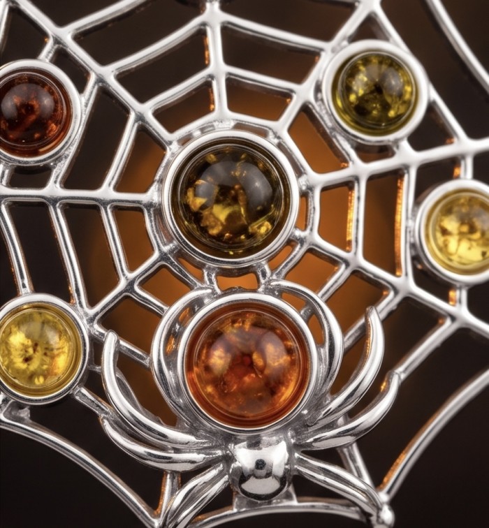 Spider's Web - Authentic Baltic Amber .925 Sterling Silver handcrafted earrings - Close-up of spider web design with Baltic amber and sterling silver.