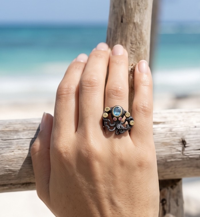 Under the Sea 4.8 carat Swiss Blue Topaz black rhodium over 2 tones .925 Sterling Silver handcrafted ring size 8 - Hand wearing "Under the Sea" blue topaz ring by the beach.