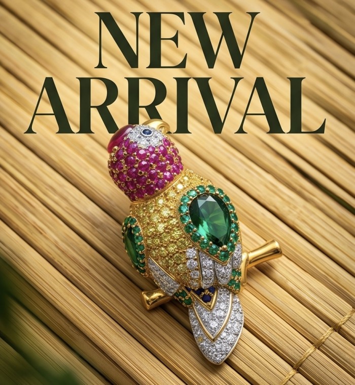 Exotic Parrot - 10.8 carat pave Ruby Emerald Sapphire 22K Gold over .925 Sterling Silver rhodium over handcrafted Brooch - Parrot brooch with rubies and emeralds on bamboo background, front view.