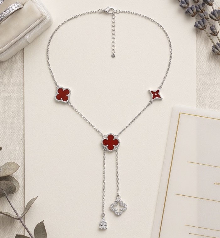 Outstanding 20 inches long Carnelian Lucky Four Leaf Clover .925 Sterling Silver necklace - Necklace with carnelian four-leaf clovers and dangling charms, top view.