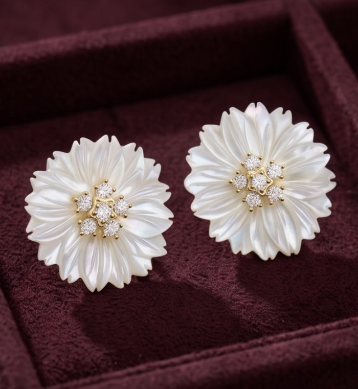 Genuine Blister Pearl 0.9 carat White Sapphire .925 Sterling Silver handcrafted Statement Earrings - Floral earrings with white sapphires, top view on maroon background.