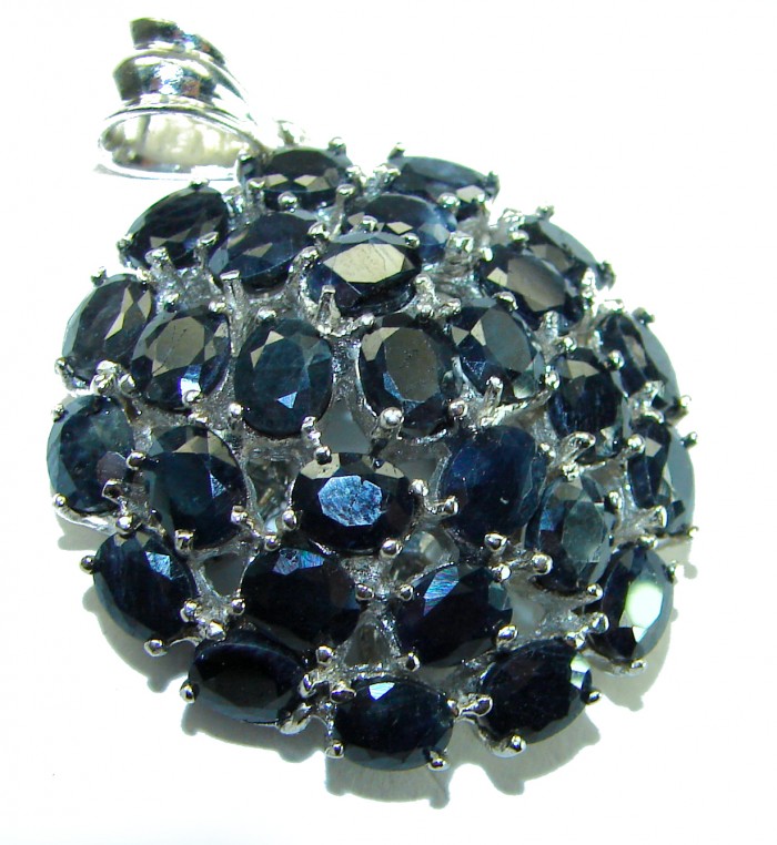 Penelope Authentic 23.5 carat faceted Sapphire .925 Sterling Silver handcrafted Statement Pendant - Close-up of Sapphire .925 Sterling pendant with multiple faceted stones