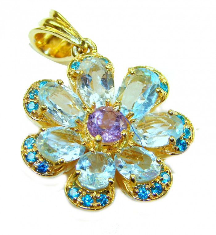 Forget Me Not 10.5 carat authentic Blue Topaz 14K GOLD OVER .925 Sterling Silver Handcrafted pendant - Flower-shaped blue topaz pendant, top view, gold setting.