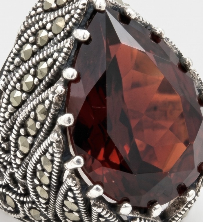 Red Mystery Authentic 18.4 carat Garnet .925 Sterling Silver brilliantly handcrafted large Statement Ring size 7 - Close-up of garnet stone in sterling silver setting with intricate details.