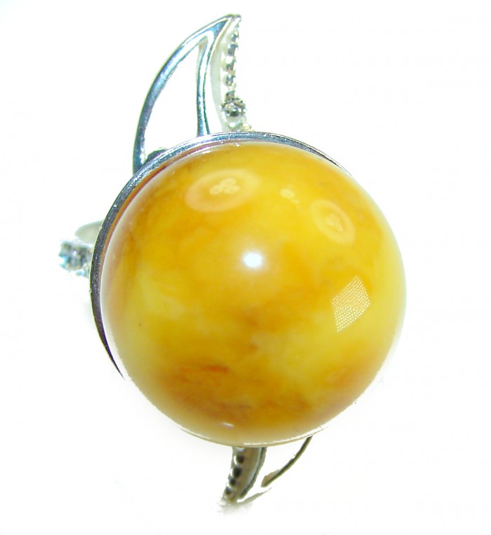 Large Golden Power Butterscotch Baltic Amber .925 Sterling Silver handcrafted ring; s. 8 - Close-up of large butterscotch amber ring with silver setting.