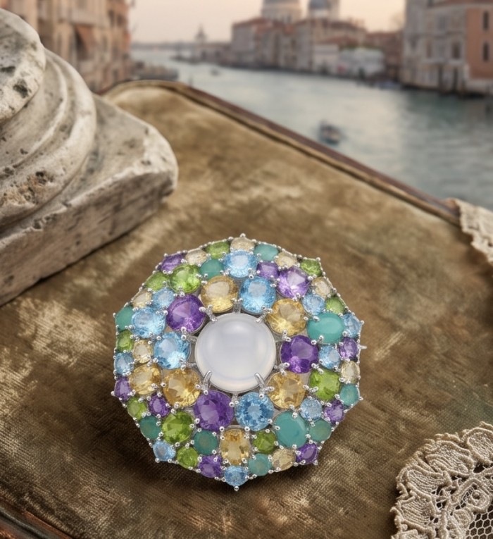 Kaleidoscope genuine 68.5 carat Brazilian Rose Quartz rhodium over .925 Sterling Silver handmade Pendant - Brooch - Kaleidoscope rose quartz jewel top view, vibrant gemstones, Venice backdrop.