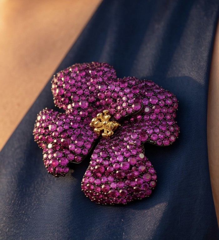 Black Label Collection - Retro Style - Rose Genuine pave 25.5 carat Ruby 2 tones .925 Sterling Silver dipped in black rhodium handmade Pendant - Brooch - Brooch close-up on blue fabric, Black Label Collection, rose pave design.