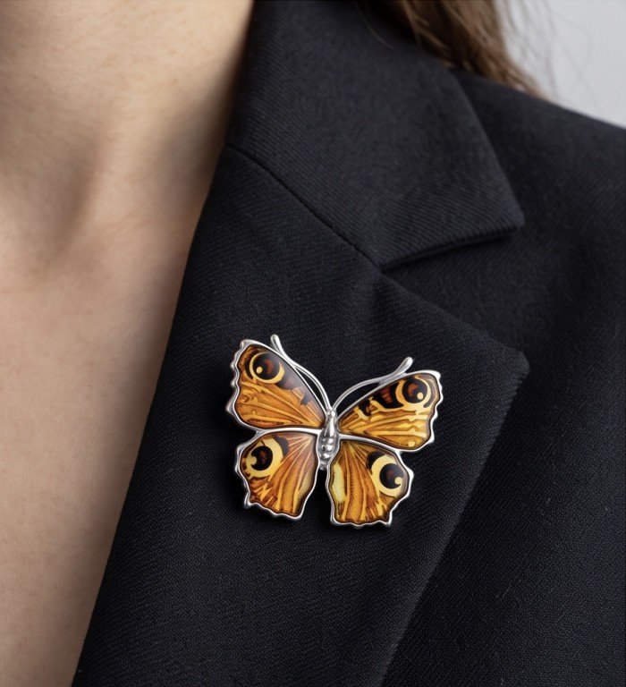 Golden Butterfly Authentic carved Baltic Amber 18K Gold over .925 Sterling Silver handcrafted pendant - Golden butterfly Baltic amber brooch worn on a black blazer.