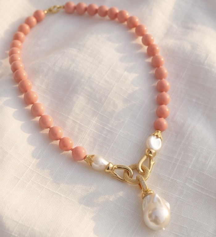 Luxurious Argentinian Pink Opal 14K Gold over .925 Sterling Silver handmade Necklace - Luxurious necklace on fabric, highlighting pink opals and gold details.