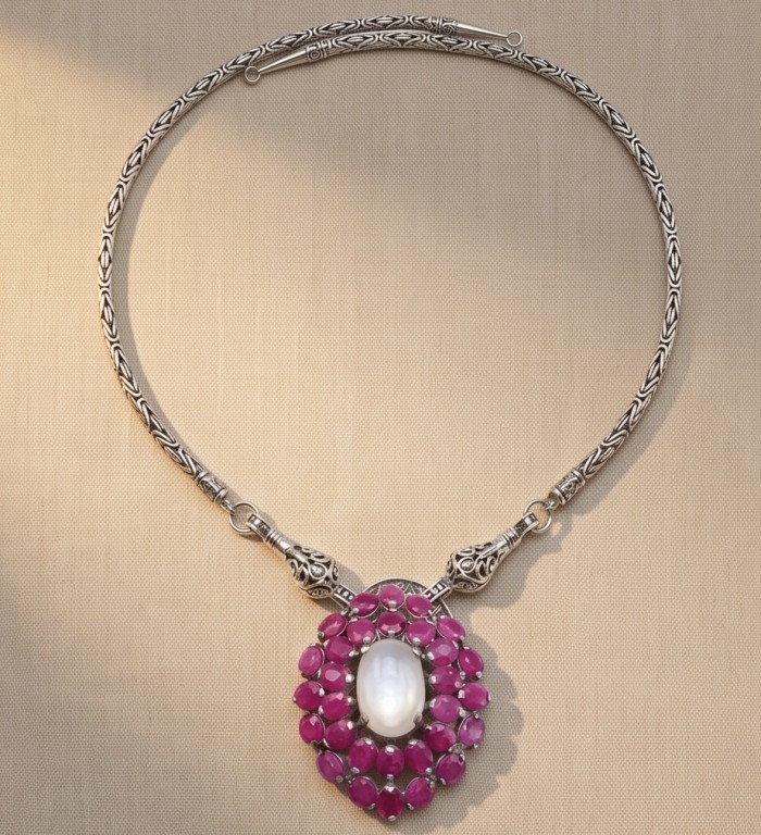Strawberry's Field - 10.2 carat Rose Quartz 14.7 Ruby rhodium over .925 Sterling Silver .925 Sterling Silver Necklace - Necklace with rose quartz and ruby pendant, front view.