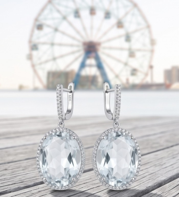Angelina 14.9 carat authentic White Topaz .925 Sterling Silver Handcrafted Earrings - White Topaz earrings front view with Ferris wheel in background