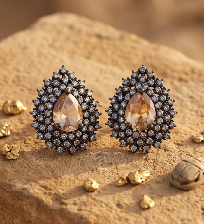 Renaissance 5.5 carat Morganite black rhodium over .925 Sterling Silver handcrafted earrings - Close-up of Renaissance 5.5 carat Morganite earrings on stone surface