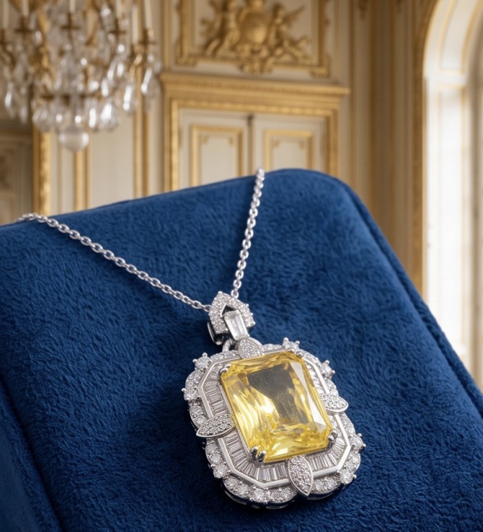 Art Deco - Baquette cut 35.5 carat YELLOW SAPPHIRE .925 Sterling Silver dipped in Rhodium handcrafted necklace - Yellow sapphire necklace on blue stand, showcasing front view.