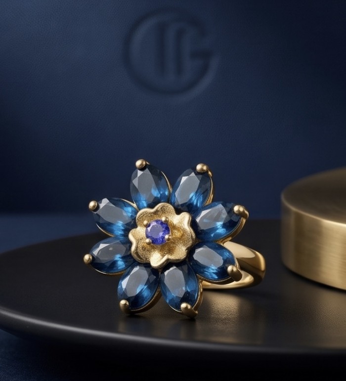 Magic Flower petal 10.8 carat authentic London Blue Topaz 0.2 carat Tanzanite 22k Gold over.925 Sterling Silver handmade Statement Ring size 7 - Front view of Magic Flower ring with blue topaz petals on display.