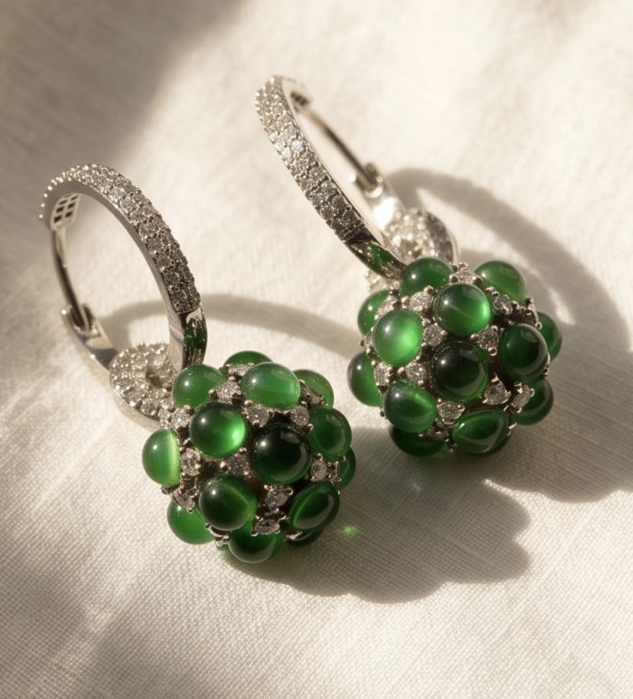 Giovanna- Authentic 6.5 CARAT natural Colombian Emerald .925 Sterling Silver handcrafted Statement earrings - Close-up of emerald earrings with diamond accents on a light surface.