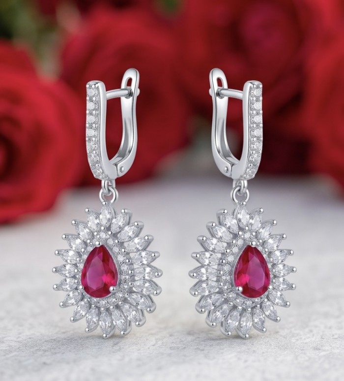 Exquisite 5.4 ctw Mozambique Ruby .925 Sterling Silver handcrafted Statement earrings - Elegant earrings with rubies and diamonds on a soft background.