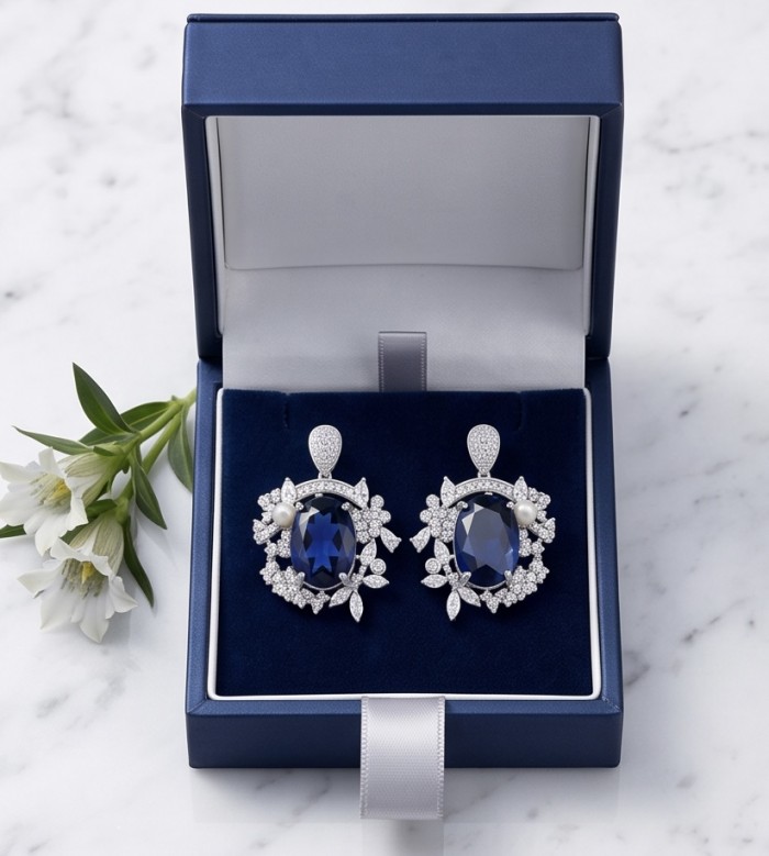 Vintage style - Giovanna - oval pear cut 7.9 carat Sapphire .925 Sterling Silver handcrafted earrings - Boxed sapphire earrings with floral accents, top view.