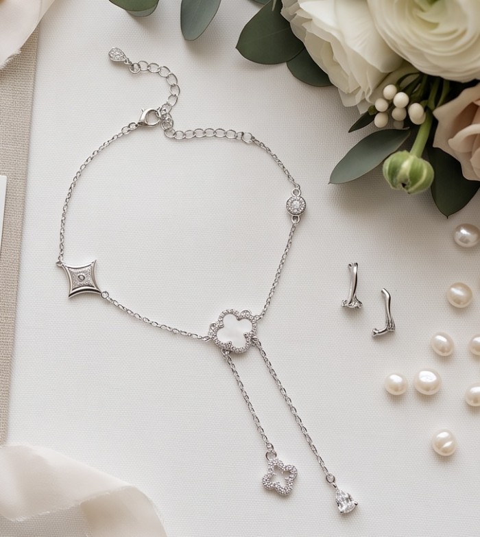 Outstanding Rainbow Blister Paerl Lucky Four Leaf Clover .925 Sterling Silver necklace - Top view of silver necklace with clover design, pearls, and floral accents.