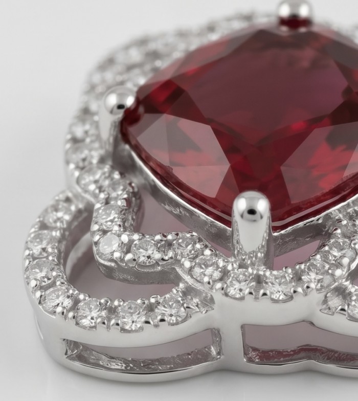 Authentic 6.5 CARAT Ruby .925 Sterling Silver Pendant - Close-up of a 6.5 carat ruby pendant with silver and diamond accents.