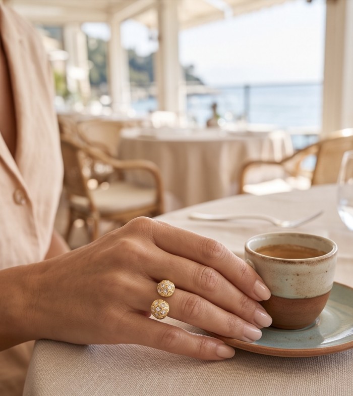 Luxurious 3.8 carat White Topaz 14K Gold over .925 Sterling Silver handcrafted Statement Ring size 7 - Ring worn on hand with coffee cup in elegant setting