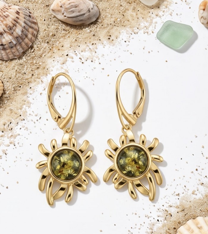 Sun Green Baltic Polish Amber 18k Gold over .925 Sterling Silver earrings - Sun-shaped amber earrings on sand with shells, top view