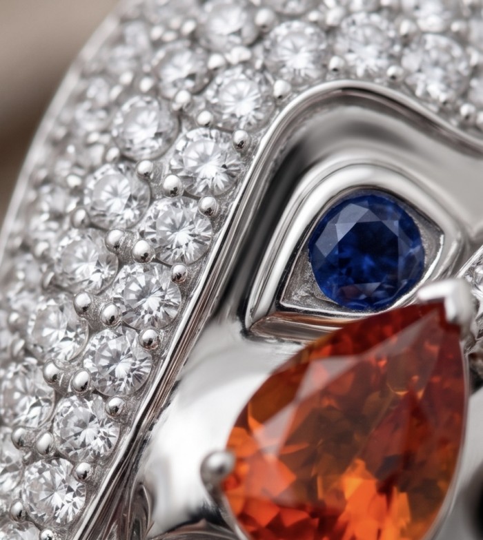 Attract YOUR Luck - ELEPHANT- 4.2 CARAT Ruby 0.4 carat Sapphire .925 Sterling Silver dipped in rhodium handcrafted Pendant Brooch - Close-up of jeweled elephant jewelry featuring ruby and sapphire stones.
