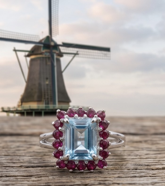 Atlantica 5.8 carat Swiss Blue Topaz .925 Sterling Silver dipped in rhodium handcrafted ring size 9 - Blue topaz ring close-up with windmill in background