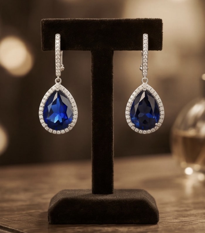 Vintage style - Marlyn - pear cut 14.9 carat Sapphire .925 Sterling Silver handcrafted earrings - Front view of vintage-style pear cut sapphire earrings on display.