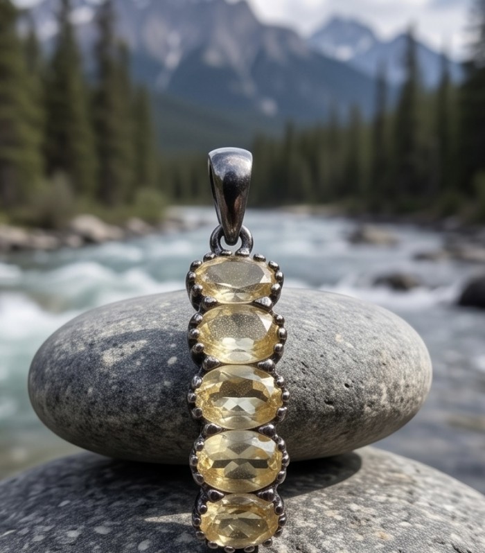 Victoria Authentic 9.4 carat Brazilian Citrine .925 Sterling Silver dipped in black rhodium brilliantly handcrafted Pendant - Close-up of Victoria Authentic Citrine pendant on river stone background