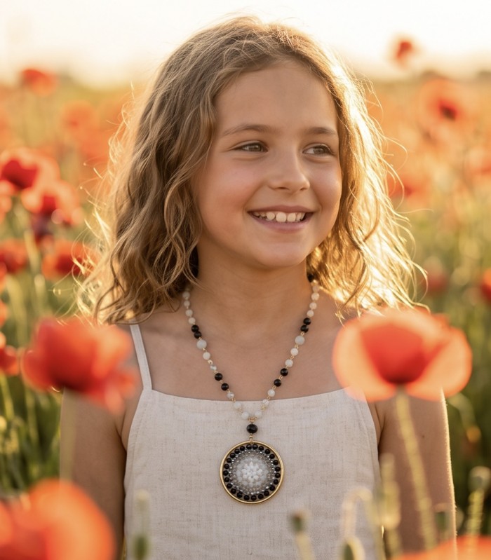 Magnificent Moonlight Crystal Onyx 14K Gold over .925 Sterling Silver handmade Necklace - Girl wearing Magnificent Moonlight Crystal Onyx necklace in a field of flowers