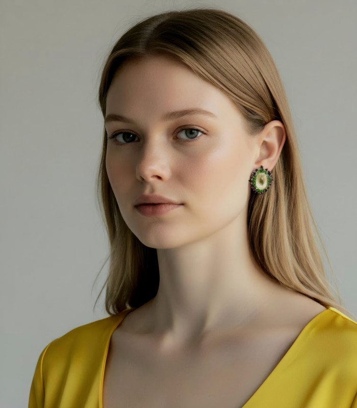 Bringer of Joy Authentic 29.9 carat Brazilian Citrine rhodium over .925 Sterling Silver brilliantly handcrafted Statement earrings - Side view: woman wearing citrine earrings with green accents