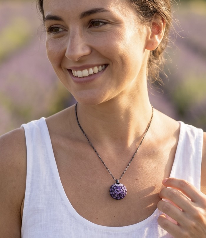 Mademoiselle - 18.5 carat natural Amethyst .925 Sterling Silver dipped in black rhodium handcrafted Pendant Brooch - Woman wearing amethyst pendant necklace, front view close-up.