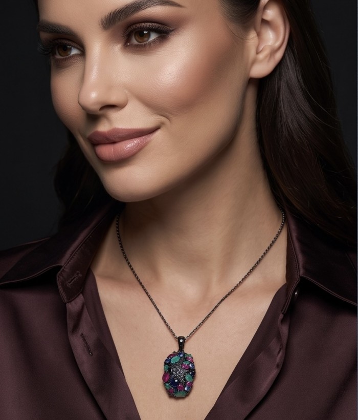 Vintage Beauty 10.7 carat Emerald Ruby Sapphire Black Rhodium over .925 Sterling Silver handcrafted pendant - Side view of woman wearing Vintage Beauty gemstone pendant necklace.