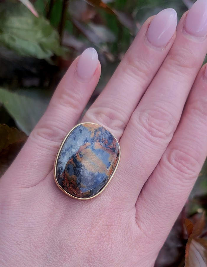 Large Silky Golden Pietersite 14K Gold over .925 Sterling Silver handmade Ring size 8 - Close-up of Large Silky Golden Pietersite ring worn on hand.