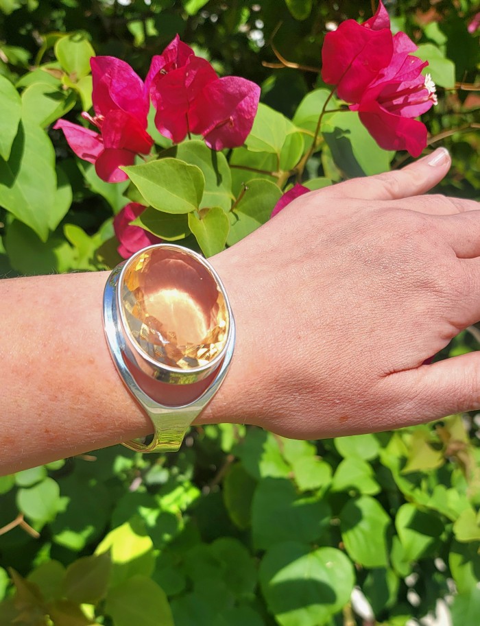 Simplicity 87.5 carat Genuine Lemon Quartz handcrafted .925 Sterling Silver Bracelet / Cuff - Worn on hand: 87.5 carat Lemon Quartz bangle in natural light